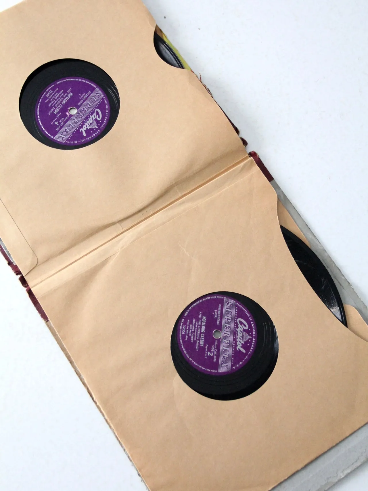 1950s Hoplalong Cassidy boots and record book
