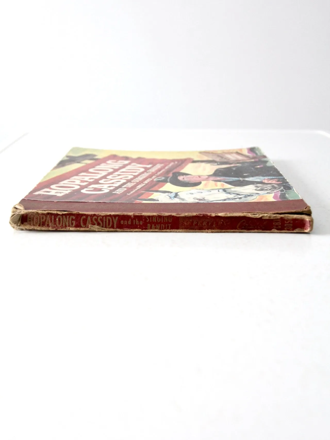 1950s Hoplalong Cassidy boots and record book