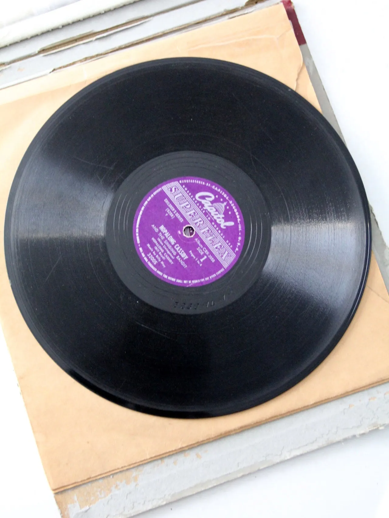1950s Hoplalong Cassidy boots and record book