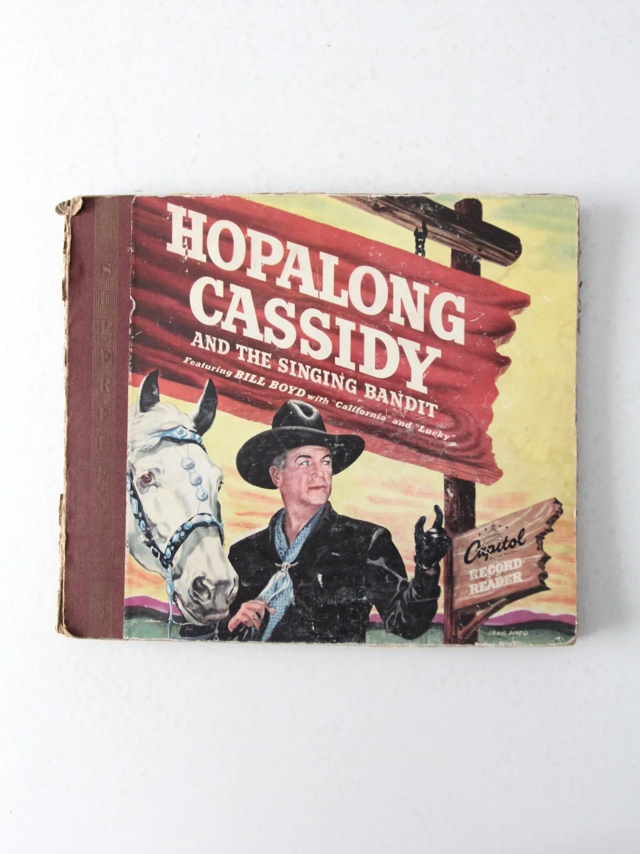 1950s Hoplalong Cassidy boots and record book